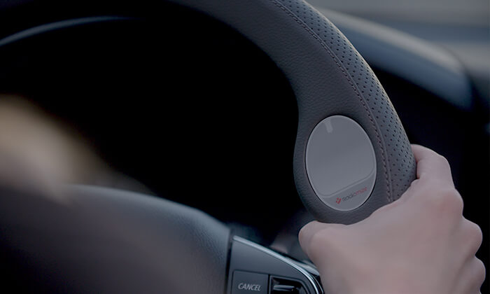 7 כיסוי הגה חכם JustDrive לשימוש בטוח בסלולרי בזמן נהיגה